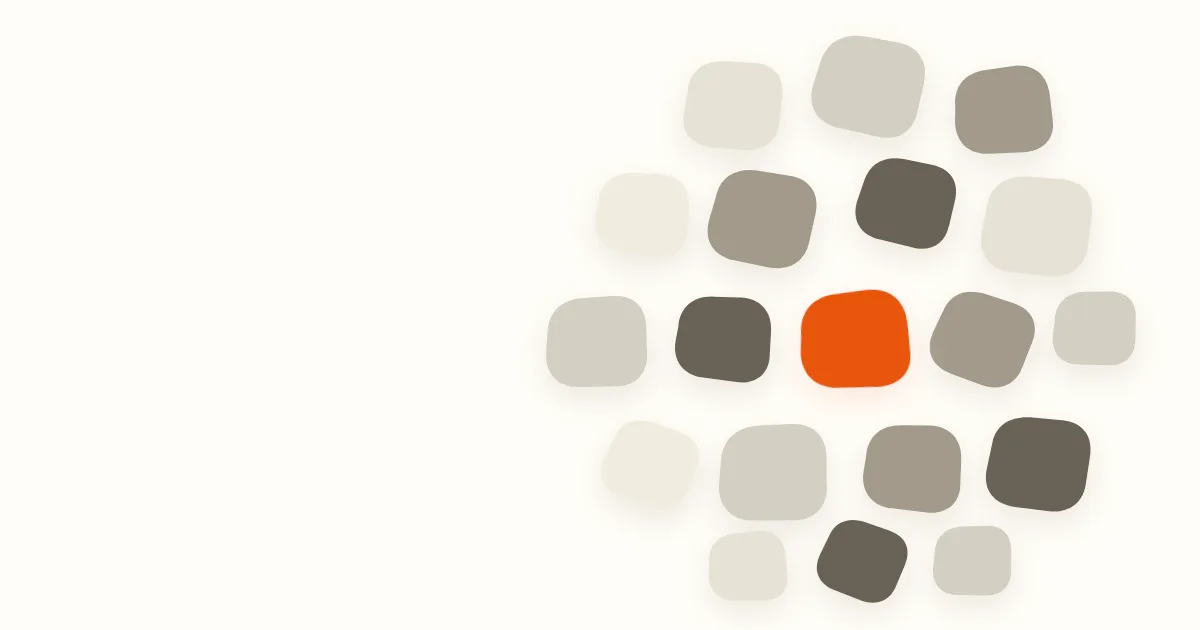 Nineteen rounded cream, beige, taupe, and dark brown tiles form a loose cluster, with one orange tile near the center